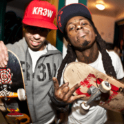 Lil Wayne Playfully Dubs Cory Gunz as the "Son of Peter Gunz" During On-Stage Performance image