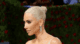 Kim Kardashian's Bold Hair Transformation - A New Look for the Queen of Urban Glam