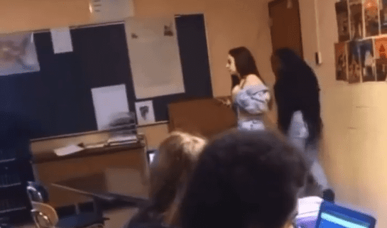 Shocking Incident: Michigan Teacher Knocked Out by Student with a Metal Chair During Heated Clash! In a jaw-dropping incident that's sending shockwaves through the urban scene, a Michigan teacher found herself on the receiving end of a brutal knockout punch – delivered by none other than a student who hurled a metal chair in the heat of a dispute! Talk about a wild scene straight out of a hip-hop showdown.