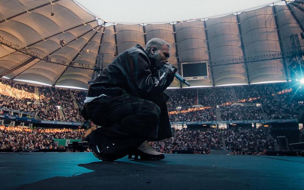 50 Cent Joins Chris Brown in Manchester Amid Legal Storm