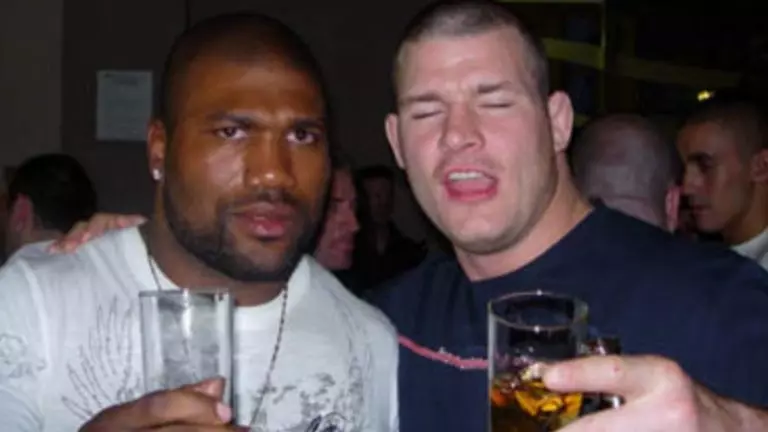 Rampage Jackson celebrating with fans after a UFC fight.