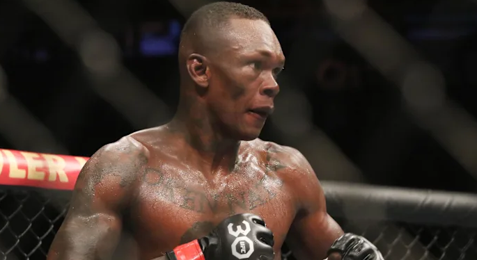 Israel Adesanya’s “Kirk Shot” Joke Sparks Backlash: When Edgy Humor Becomes Empty Shock Value